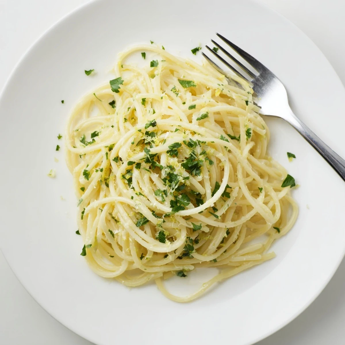 Creamy one pot garlic butter pasta coated in glossy Parmesan sauce with fresh parsley