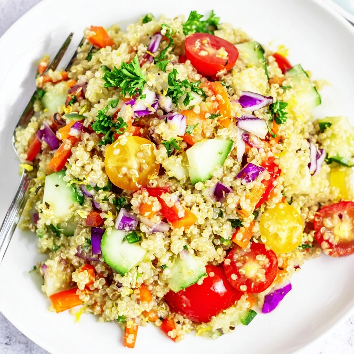 Summer ready Rainbow Quinoa Salad With Lemon Dressing tossed with zesty lemon, crunchy vegetables