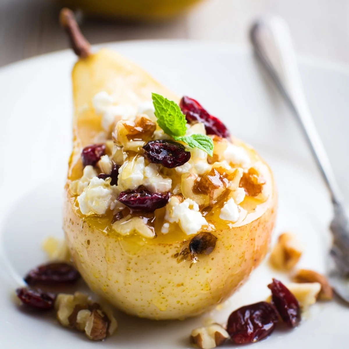 Warm Baked Pears With Feta Honey Cranberries, caramelized edges and fresh mint