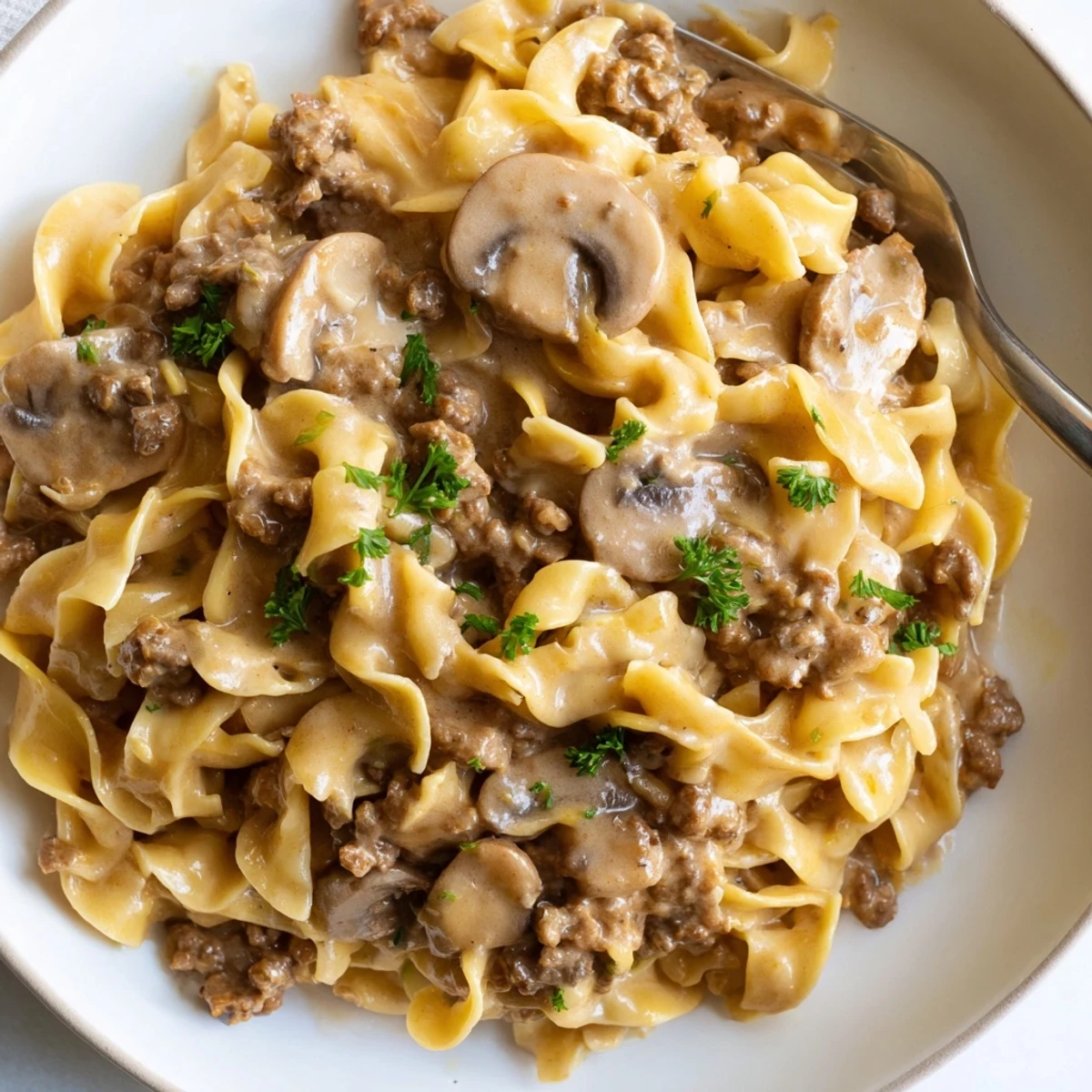 Hearty hamburger stroganoff with savory ground beef and mushrooms in rich sour cream sauce